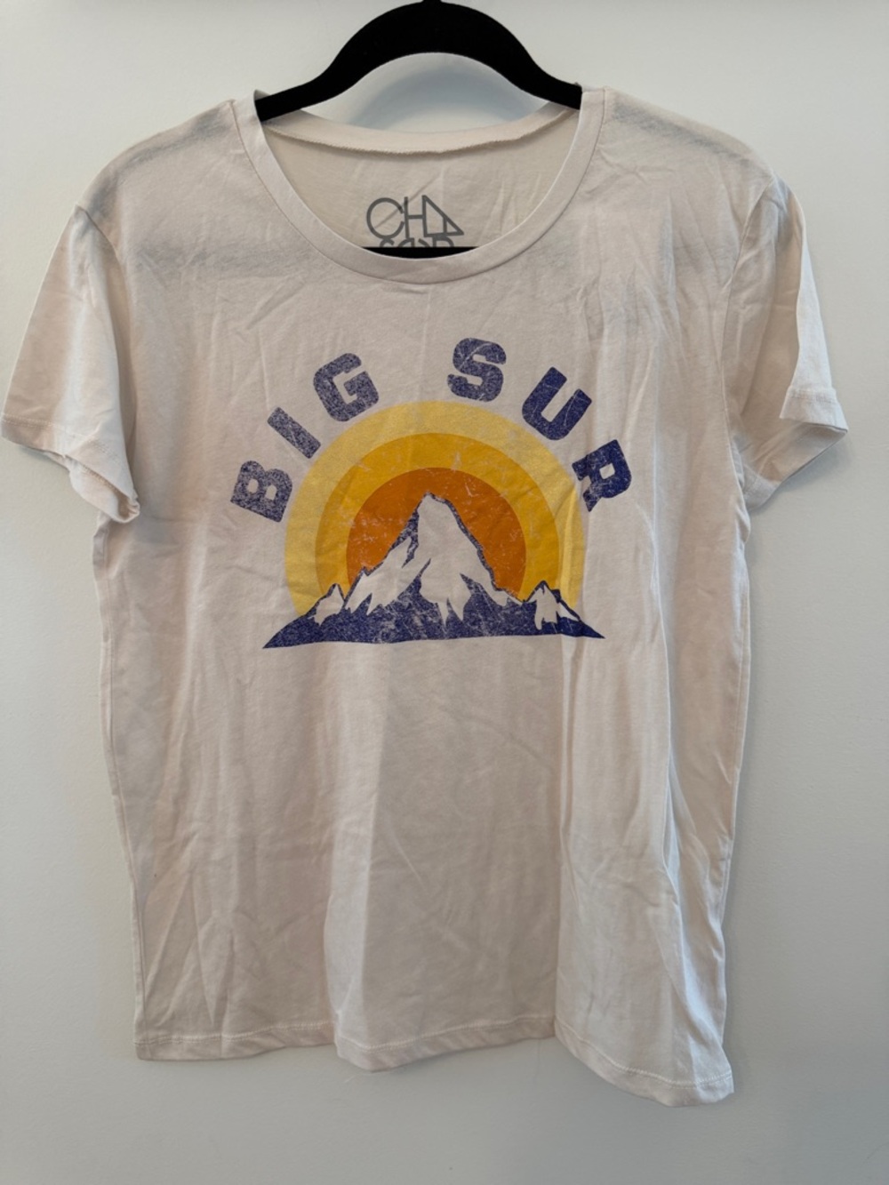 Chaser White Tee with Yellow & Orange Sunburst and Purple Graphic
